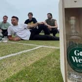The Tailenders James Anderson, Greg James, Felix White and Matt Horan celebrate their own branded gin which raised £10,000 for Pendleside
