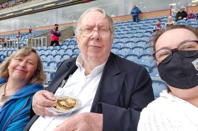 Former Burnley MP with his daughters Carol (left) and Jane on his beloved Turf Moor