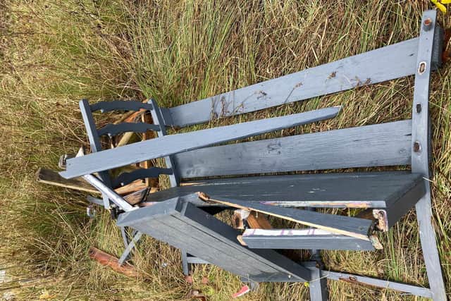 One of the damaged benches