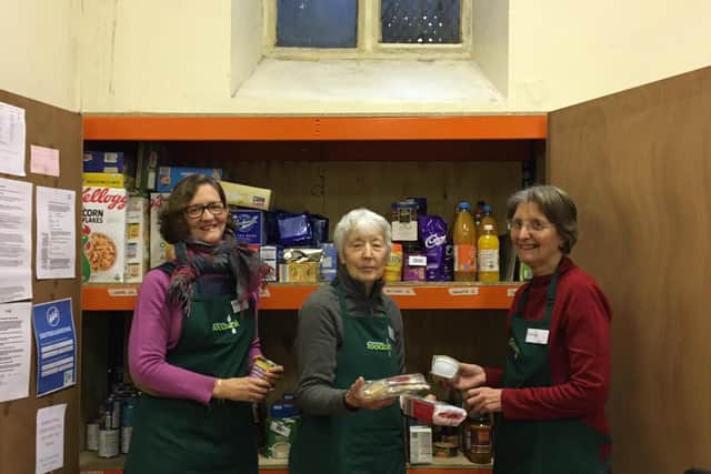 Jane Chitnis with Ribble Valley Foodbank volunteers packing essentials for the needy