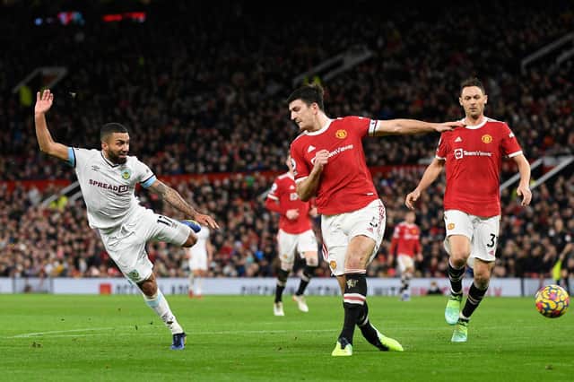 Aaron Lennon scores at Old Trafford
