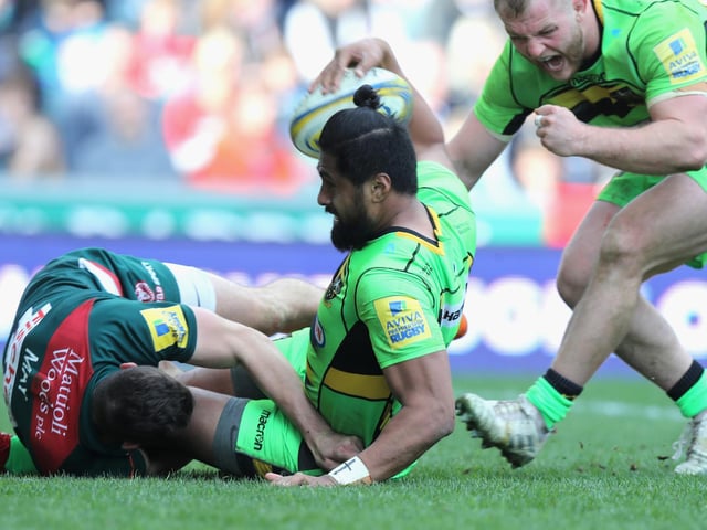 Mike Haywood helped Ahsee Tuala to celebrate his try