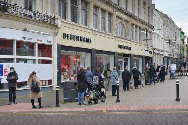 Hastings town centre pictured at the end of England's second lockdown on 2/12/20.

Queue for Debenhams SUS-220224-134040001