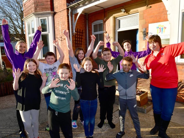 Great to be back - some of the first children enjoying a holiday at Derbyshire Children's Holiday Centre with staff (from left) Gemma McDonald, Yasmin Ahmed and manager Ali Byerley.