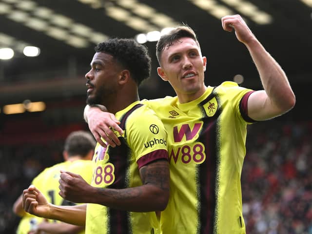 SHEFFIELD, ENGLAND - APRIL 20: Burnley goalscorer Lyle Foster celebrates after scoring the third Burnely goal with Dara O' Shea (r) during the Premier League match between Sheffield United and Burnley FC at Bramall Lane on April 20, 2024 in Sheffield, England. (Photo by Stu Forster/Getty Images)