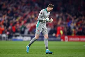 CARDIFF, WALES - MARCH 24: Wayne Hennessey of Wales celebrates after teammate Gareth Bale (not pictured) scored their side's second goal during the 2022 FIFA World Cup Qualifier knockout round play-off match between Wales and Austria at Cardiff City Stadium on March 24, 2022 in Cardiff, Wales. (Photo by Ryan Pierse/Getty Images)