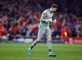 CARDIFF, WALES - MARCH 24: Wayne Hennessey of Wales celebrates after teammate Gareth Bale (not pictured) scored their side's second goal during the 2022 FIFA World Cup Qualifier knockout round play-off match between Wales and Austria at Cardiff City Stadium on March 24, 2022 in Cardiff, Wales. (Photo by Ryan Pierse/Getty Images)