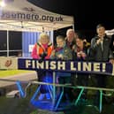 Chris, Max and Zach with Chris' parents Jackie and Andy and sister Emma at the Walk in the Dark finish