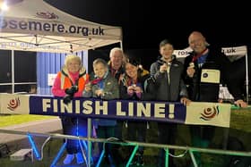 Chris, Max and Zach with Chris' parents Jackie and Andy and sister Emma at the Walk in the Dark finish
