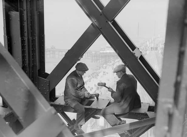 Two men working on a girder in Blackpool Tower in 1933. They seem as comfortable as if they were sat at a desk!