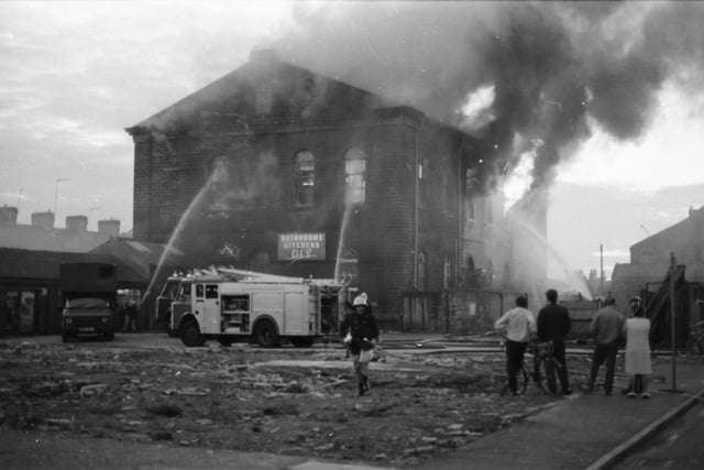September 20, 1985. This is what was written in the Express at the time:

Police and fire officials have not ruled out the possibility that one of Burnley's most spectacular blazes in years - at Robert Howe's kitchen studios in Todmorden Road - was started deliberately. Hundreds of people watched more than 30 firemen tackling the huge blaze which broke out in a ground floor office of the former Methodist chapel at just after 6.30 on Tuesday evening. Burnley's fire station commander, Mr Jim Chappell, said yesterday "We are still investigating the cause of the fire, but we cannot rule out arson." And a police spokesman said they were investigating reports that children were seen pushing lighted newspapers into the building on the evening of the fire. Police closed part of Todmorden Road and families on Eliza Street were evacuated as firemen struggled to bring the blaze under control. Six pumps, an emergency tender and a "Simon snorkel: hydraulic ladder were rushed to the scene, with some of the engines coming from Nelson and Padiham. Men wearing breathing apparatus went in early on, but the fire was breaking out behind them and they had to be withdrawn for their own safety.
The owner of the company, Mr Brian Howe, rushed over from his home in Barnoldswick. He looked on as flames engulfed the building, destroying the interior and the roof. "There were thousands of pounds worth of kitchen units in there." Said Mr Howe, whose family have had the building for the last seven years.
