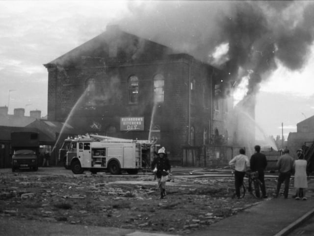 September 20, 1985. This is what was written in the Express at the time:

Police and fire officials have not ruled out the possibility that one of Burnley's most spectacular blazes in years - at Robert Howe's kitchen studios in Todmorden Road - was started deliberately. Hundreds of people watched more than 30 firemen tackling the huge blaze which broke out in a ground floor office of the former Methodist chapel at just after 6.30 on Tuesday evening. Burnley's fire station commander, Mr Jim Chappell, said yesterday "We are still investigating the cause of the fire, but we cannot rule out arson." And a police spokesman said they were investigating reports that children were seen pushing lighted newspapers into the building on the evening of the fire. Police closed part of Todmorden Road and families on Eliza Street were evacuated as firemen struggled to bring the blaze under control. Six pumps, an emergency tender and a "Simon snorkel: hydraulic ladder were rushed to the scene, with some of the engines coming from Nelson and Padiham. Men wearing breathing apparatus went in early on, but the fire was breaking out behind them and they had to be withdrawn for their own safety.
The owner of the company, Mr Brian Howe, rushed over from his home in Barnoldswick. He looked on as flames engulfed the building, destroying the interior and the roof. "There were thousands of pounds worth of kitchen units in there." Said Mr Howe, whose family have had the building for the last seven years.