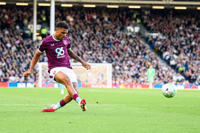 Lyle Foster crosses for Zian Flemming to put Burnley ahead against Fulham. Photo: Kelvin Lister-Stuttard