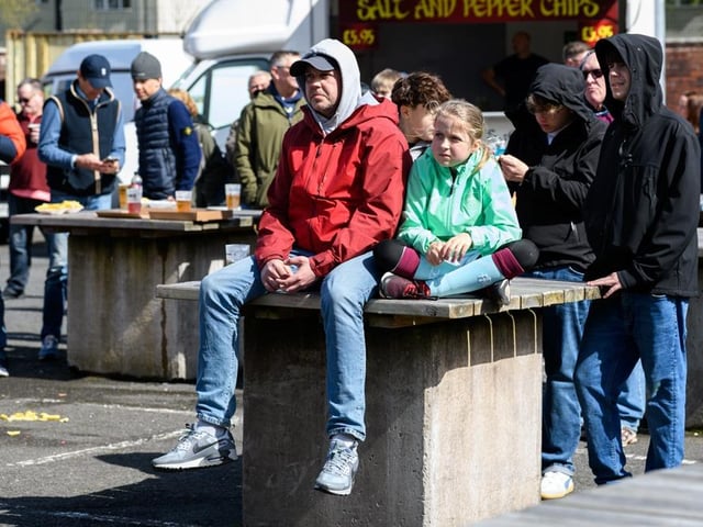 Burnley fans arrive at Turf Moor for the Premier League fixture against Brighton and Hove Albion. Photo: Kelvin Lister-Stuttard