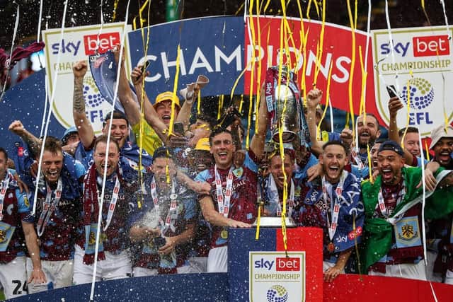 Burnley will line up in the Premier League once again after romping to the Championship title