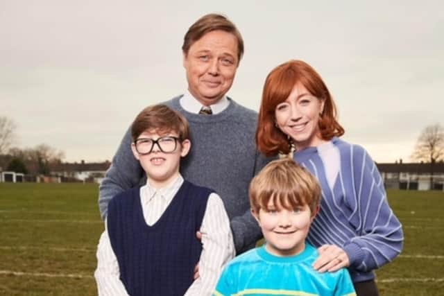 Taylor Fay (front right) who stars as Gary Carr in the new sitcom based on the life of comedian Alan Carr. Oliver Savell (left) plays Alan as a child and Nancy Sullivan Shaun Dooley plays the role of parents Graham and Christine Carr.