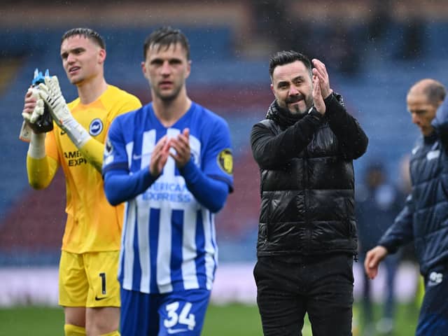 BURNLEY, ENGLAND - APRIL 13: Roberto De Zerbi, Manager of Brighton & Hove Albion, applauds the fans after the draw in the Premier League match between Burnley FC and Brighton & Hove Albion at Turf Moor on April 13, 2024 in Burnley, England. (Photo by Gareth Copley/Getty Images) (Photo by Gareth Copley/Getty Images)