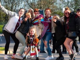 Burnley fans arrive at the New York Stadium ahead of their Championship fixture with Rotherham United. Photo: Kelvin Stuttard