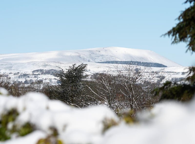Pendle Hill from Towneley Park during snowfall in March 2023. Photo: Kelvin Stuttard