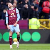 BURNLEY, ENGLAND - NOVEMBER 04: Jordan Beyer of Burnley reacts as Jeffrey Schlupp of Crystal Palace (not pictured) scores the team's first goal during the Premier League match between Burnley FC and Crystal Palace at Turf Moor on November 04, 2023 in Burnley, England. (Photo by George Wood/Getty Images)