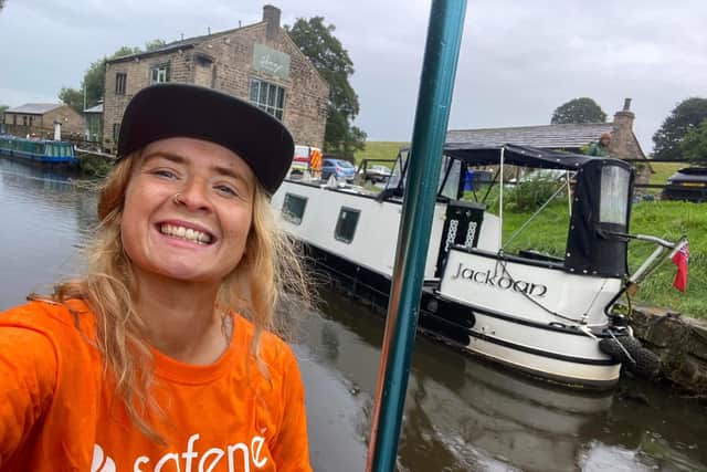 Beth Roberts embarked on a 30-mile paddleboard journey on the Leeds and Liverpool canal, raising over £800 in the process for SafeNet Domestic Abuse and Support Services.