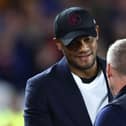 Burnley's Belgian manager Vincent Kompany (L) shakes hands with Nottingham Forest's Welsh manager Steve Cooper (R) ahead of kick-off in the English Premier League football match between Nottingham Forest and Burnley at The City Ground in Nottingham, central England, on September 18, 2023. (Photo by Darren Staples / AFP) / RESTRICTED TO EDITORIAL USE. No use with unauthorized audio, video, data, fixture lists, club/league logos or 'live' services. Online in-match use limited to 120 images. An additional 40 images may be used in extra time. No video emulation. Social media in-match use limited to 120 images. An additional 40 images may be used in extra time. No use in betting publications, games or single club/league/player publications. /  (Photo by DARREN STAPLES/AFP via Getty Images)