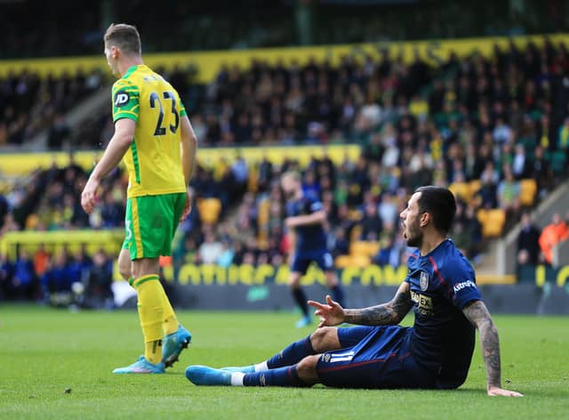 NORWICH, ENGLAND - APRIL 10: Dwight McNeil of Burnley reacts during the Premier League match between Norwich City and Burnley at Carrow Road on April 10, 2022 in Norwich, England. (Photo by Stephen Pond/Getty Images)