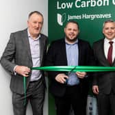 (Left to right) Director Bill Davies, Burnley MP Anthony Higginbotham and Sustainability Home Centre manager Craig Payne cut the ribbon.