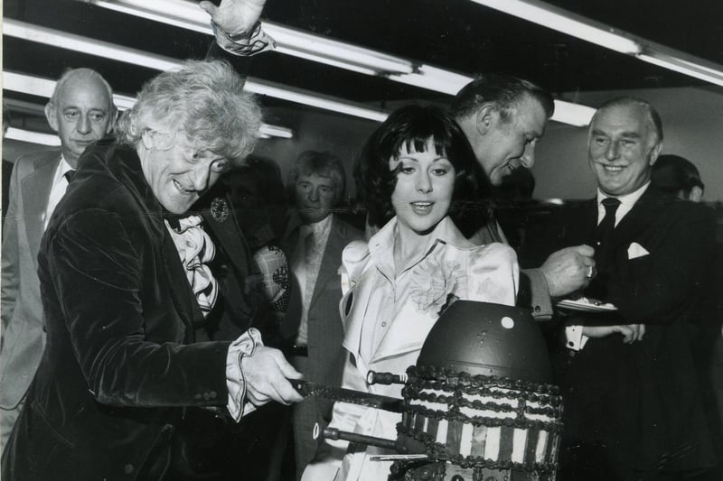 Jon Pertwee and Sarah Jane Smith with a chocolate Dalek baked specially for the opening of the Dr Who Exhibition in Blackpool, 1974