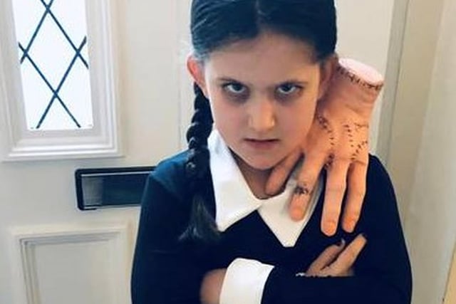 Daisy Nuttall (seven), who is in Year 3 at St John's RC Primary School in Padiham, as Wednesday Addams.