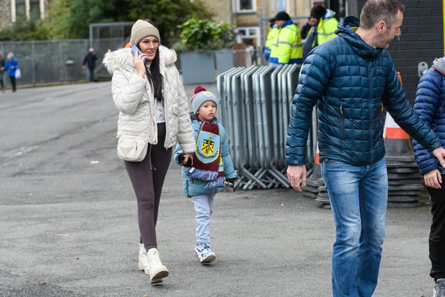 Burnley fans arrive at Turf Moor ahead of the Championship fixture against Swansea City. Photo: Kelvin Stuttard