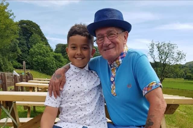Burnley man Ian Lofthouse with his eldest grandchild, Isaac, now 15.
