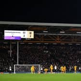 LONDON, ENGLAND - NOVEMBER 27: A general view of the inside of the stadium as The LED board shows the message "Checking Possible Penalty Foul", after a VAR Review takes place after Harry Wilson of Fulham (not pictured) is fouled by Joao Gomes of Wolverhampton Wanderers (not pictured), during the Premier League match between Fulham FC and Wolverhampton Wanderers at Craven Cottage on November 27, 2023 in London, England. (Photo by Mike Hewitt/Getty Images)