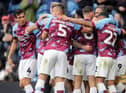 Burnley's Jay Rodriguez is mobbed by team-mates as he celebrates scoring his side's fourth goal 

The EFL Sky Bet Championship - Burnley v Swansea City - Saturday 15th October 2022 - Turf Moor - Burnley