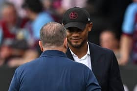 Burnley's Belgian manager Vincent Kompany (R) and Tottenham Hotspur's Greek-Australian Head Coach Ange Postecoglou (L) shake hands after the English Premier League football match between Burnley and Tottenham Hotspur at Turf Moor in Burnley, north-west England on September 2, 2023. Tottenham won the game 5-2. (Photo by Paul ELLIS / AFP) / RESTRICTED TO EDITORIAL USE. No use with unauthorized audio, video, data, fixture lists, club/league logos or 'live' services. Online in-match use limited to 120 images. An additional 40 images may be used in extra time. No video emulation. Social media in-match use limited to 120 images. An additional 40 images may be used in extra time. No use in betting publications, games or single club/league/player publications. /  (Photo by PAUL ELLIS/AFP via Getty Images)