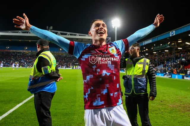 Roberts celebrates after helping Burnley win the title at Ewood Park