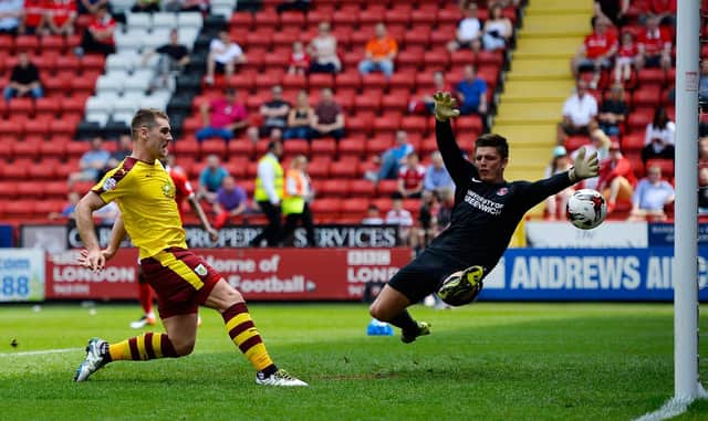 LONDON, ENGLAND - MAY 07:  Sam Vokes of Burnley scores his team's first goal past Nick Pope of Charlton Athletic during the Sky Bet Championship match between Charlton Athletic and Burnley on May 7, 2016 in London, United Kingdom.  (Photo by Justin Setterfield/Getty Images)