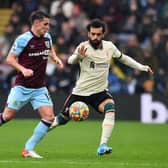 BURNLEY, ENGLAND - FEBRUARY 13: (THE SUN OUT, THE SUN ON SUNDAY OUT) Mohamed Salah of Liverpool competing with  Ashley Westwood of Burnley during the Premier League match between Burnley and Liverpool at Turf Moor on February 13, 2022 in Burnley, England. (Photo by Andrew Powell/Liverpool FC via Getty Images)