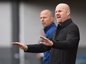Burnley's English manager Sean Dyche gestures on the touchline during the English Premier League football match between Burnley and Manchester City at Turf Moor in Burnley, north west England on April 2, 2022.