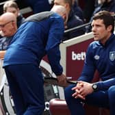 LONDON, ENGLAND - APRIL 17: Mike Jackson, Caretaker Manager of Burnley looks on from the dugout prior to the Premier League match between West Ham United and Burnley at London Stadium on April 17, 2022 in London, England. (Photo by Ryan Pierse/Getty Images)
