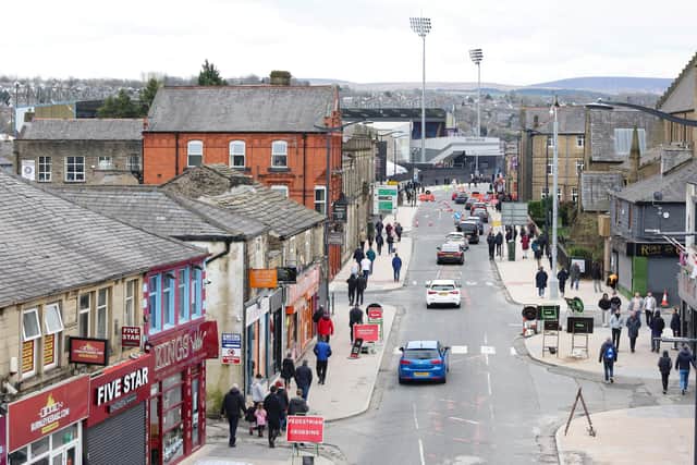BURNLEY, ENGLAND - MARCH 16: General view as fans make their way to the stadium prior to the Premier League match between Burnley FC and Brentford FC at Turf Moor on March 16, 2024 in Burnley, England. (Photo by Matt McNulty/Getty Images)