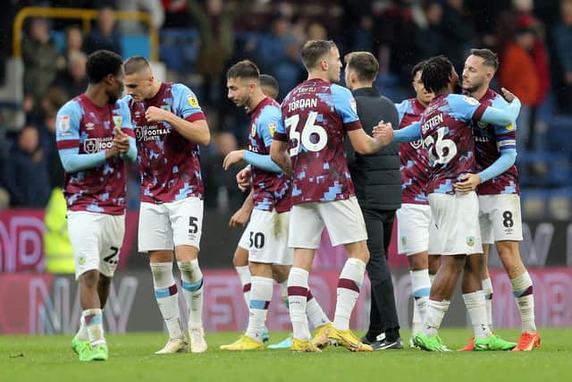 Burnley players celebrate at the final whistle

The EFL Sky Bet Championship - Burnley v Reading - Saturday 29th October 2022 - Turf Moor - Burnley