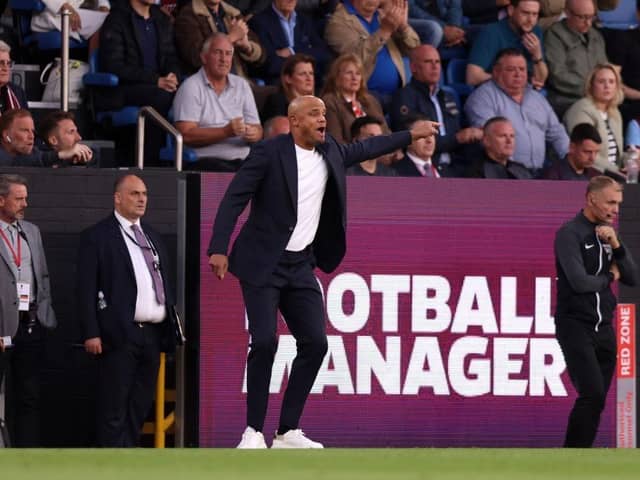 BURNLEY, ENGLAND - AUGUST 11: Vincent Kompany, Head Coach of Burnley gives the team instructions during the Premier League match between Burnley FC and Manchester City at Turf Moor on August 11, 2023 in Burnley, England. (Photo by Nathan Stirk/Getty Images)