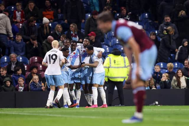 BURNLEY, ENGLAND - NOVEMBER 04: Tyrick Mitchell of Crystal Palace celebrates with teammates after scoring the team's second goal during the Premier League match between Burnley FC and Crystal Palace at Turf Moor on November 04, 2023 in Burnley, England. (Photo by George Wood/Getty Images)