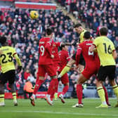 LIVERPOOL, ENGLAND - FEBRUARY 10: Dara O'Shea of Burnley scores his team's first goal during the Premier League match between Liverpool FC and Burnley FC at Anfield on February 10, 2024 in Liverpool, England. (Photo by Justin Setterfield/Getty Images)