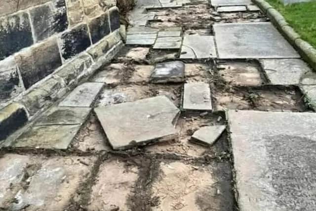 The flagstones at St Cuthbert's Church are thought to be about 200 years old