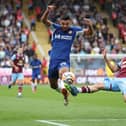 BURNLEY, ENGLAND - OCTOBER 07: Armando Broja of Chelsea battles for possession with Ameen Al-Dakhil of Burnley  during the Premier League match between Burnley FC and Chelsea FC at Turf Moor on October 07, 2023 in Burnley, England. (Photo by George Wood/Getty Images)
