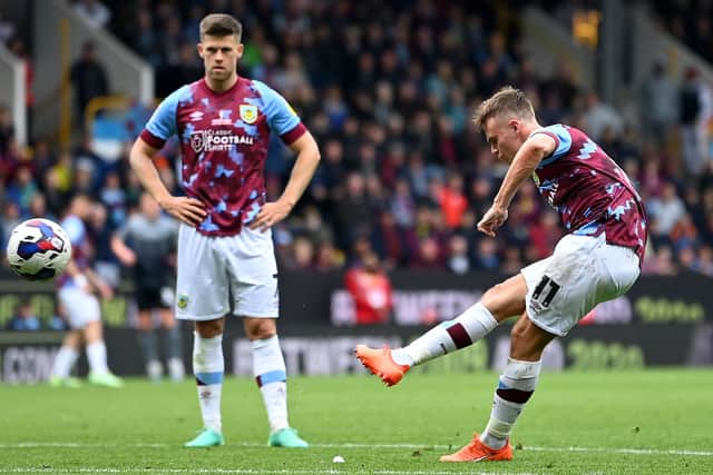 BURNLEY, ENGLAND - MAY 08: Scott Twine of Burnley scores the team's third goal from a free kick during the Sky Bet Championship between Burnley and Cardiff City at Turf Moor on May 08, 2023 in Burnley, England. (Photo by Gareth Copley/Getty Images)