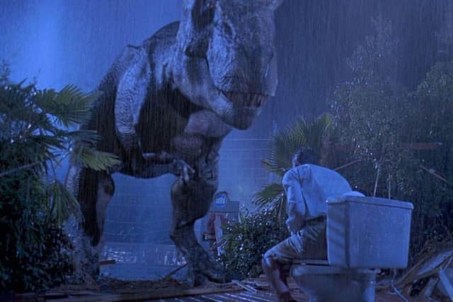 An enthroned lawyer meets his doom in Jurassic Park