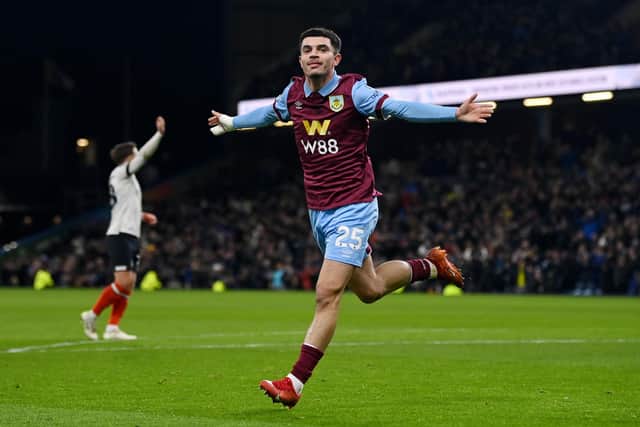 BURNLEY, ENGLAND - JANUARY 12: Zeki Amdouni of Burnley celebrates scoring his team's first goal during the Premier League match between Burnley FC and Luton Town at Turf Moor on January 12, 2024 in Burnley, England. (Photo by Gareth Copley/Getty Images)
